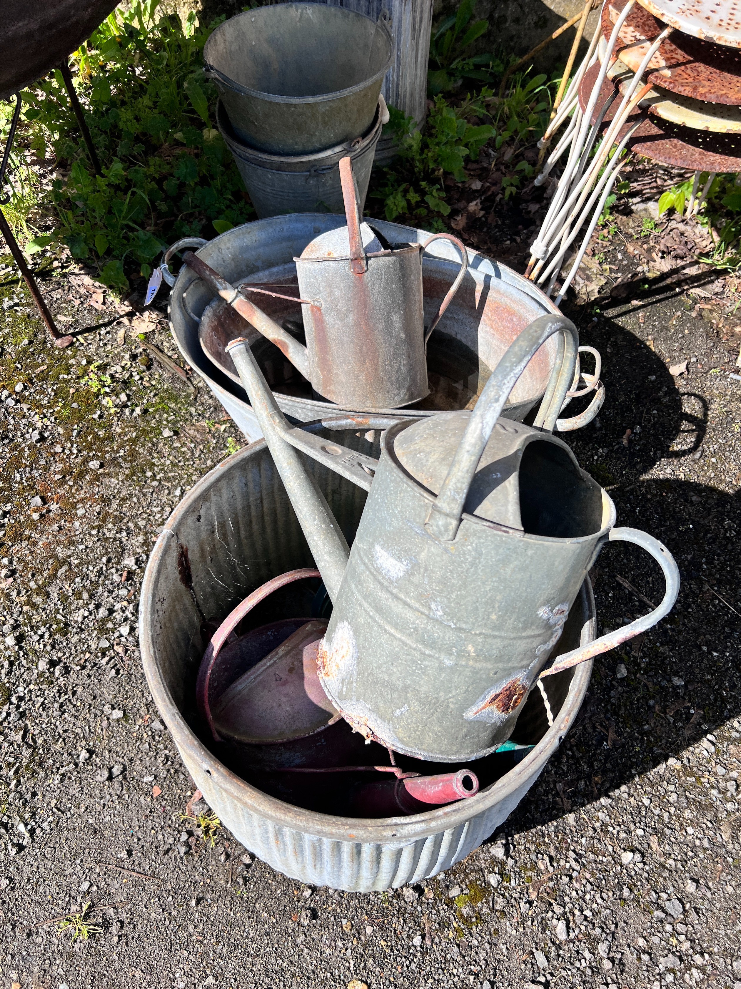 Ten assorted galvanised containers, watering cans, etc. *Please note the sale commences at 9am.